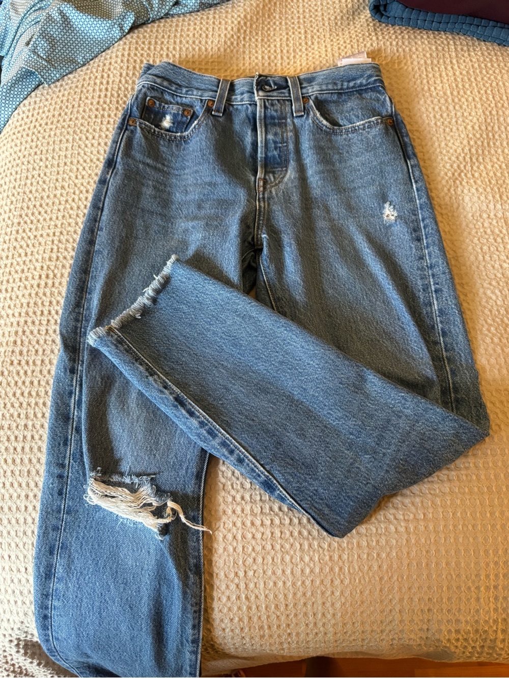 Levi's Medium Blue Distressed Ankle Jeans